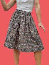 Charger l'image dans la galerie, Jupe vintage Claudia - Imprimé pois et visages Africains. Taille XS, 34, 36. Cacharel. Made in France.