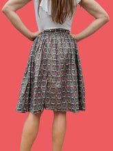 Charger l'image dans la galerie, Jupe vintage Claudia - Imprimé pois et visages Africains. Taille XS, 34, 36. Cacharel. Made in France.