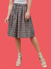 Charger l'image dans la galerie, Jupe vintage Claudia - Imprimé pois et visages Africains. Taille XS, 34, 36. Cacharel. Made in France.