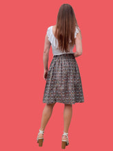 Charger l'image dans la galerie, Jupe vintage Claudia - Imprimé pois et visages Africains. Taille XS, 34, 36. Cacharel. Made in France.