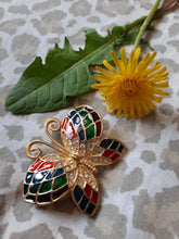Charger l'image dans la galerie, Broche June - Papillon doré et émaillé décoré de strass.